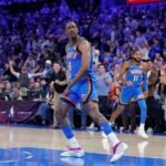 Dec 22, 2025; Oklahoma City, Oklahoma, USA; Oklahoma City Thunder guard Jalen Williams (8) looks back after dunking against the Memphis Grizzlies during the second half at Paycom Center. Mandatory Credit: Alonzo Adams-Imagn Images